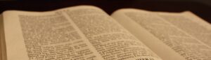 Open Bible displaying Mark 11:23